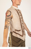  Photos Man in Historical Dress 30 16th century Historical Clothing Red suit tattoo upper body vest 0001.jpg